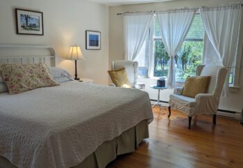 Cape House Studio room with a king bed and a twin bed next to the window