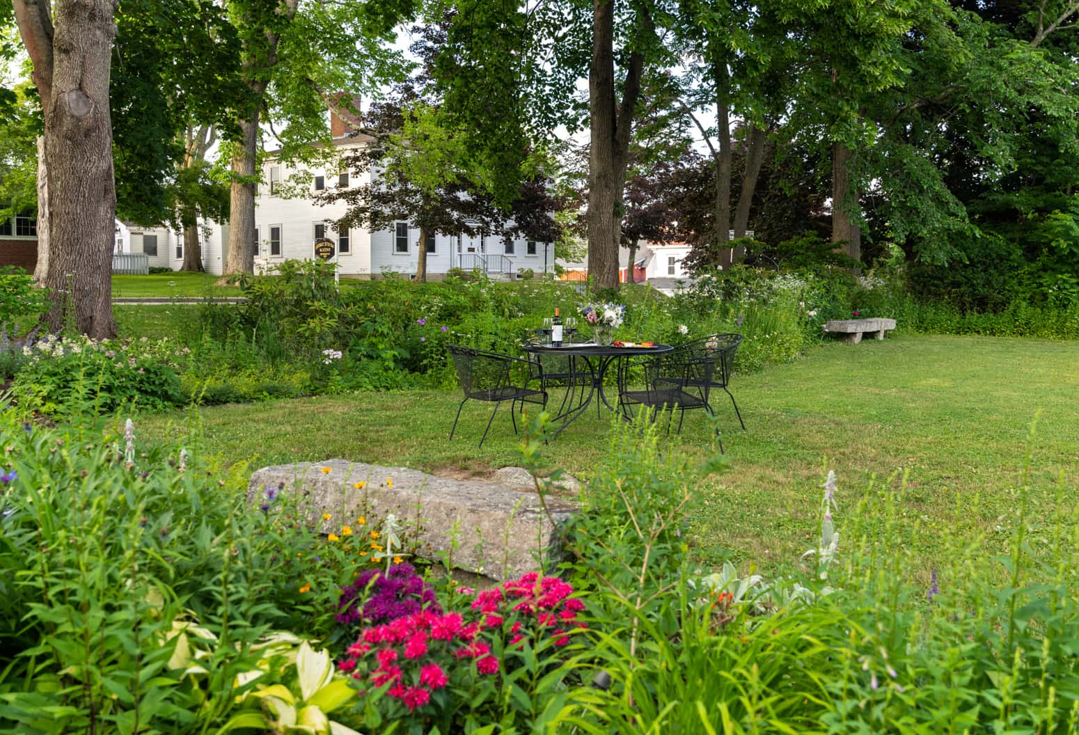 Open spaced garden with flowers and herbs at Blue Hill Inn