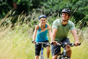 Couple riding bikes