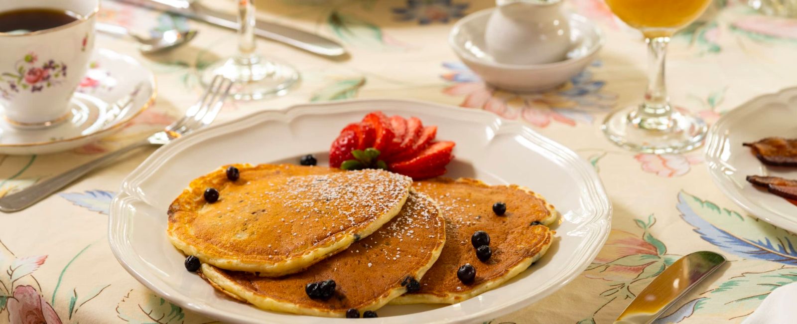A plate of pancakes on a table at the Blue Hill Inn