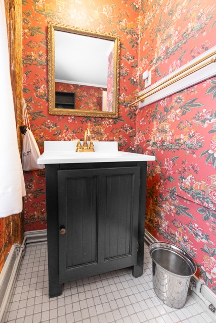 Room 2 bathroom with vanity and mirror