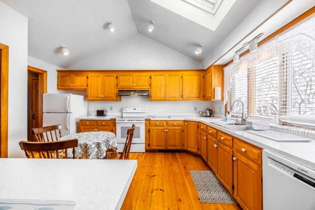 Kitchen counter, cabinets and appliances in the Cape House Suite