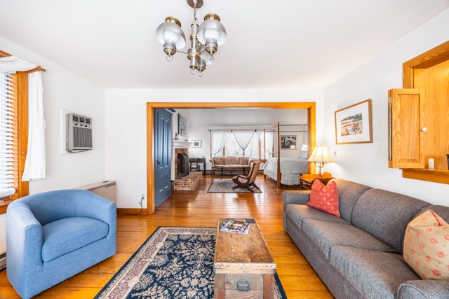 Living room in the Cape House Suite with a large seating area