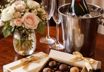 champagne, flowers and chocolate